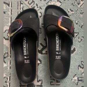 Black size 39 Birkenstocks with 1 strap. Rainbow buckle. New without tags.
